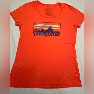 Patagonia. Orange short sleeve T-shirt. Size M.